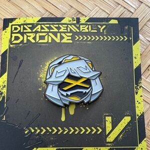 Disassembly Drone Wearable Pin - Silver and Yellow